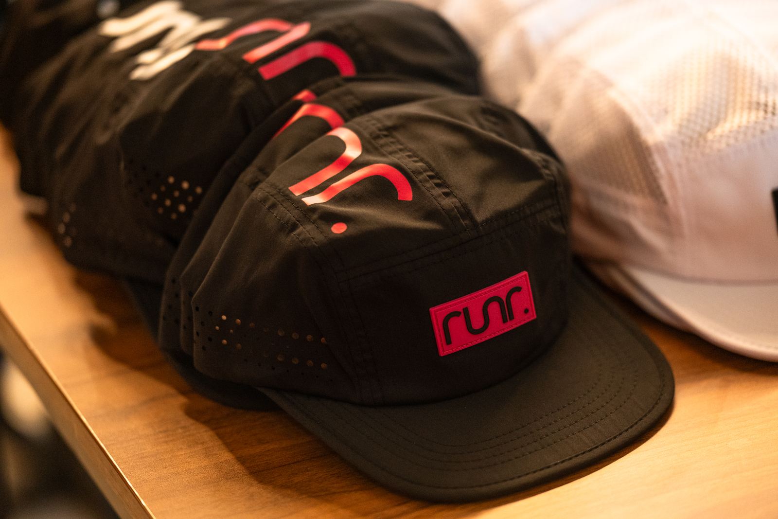 runr hats ready for attendees at the event